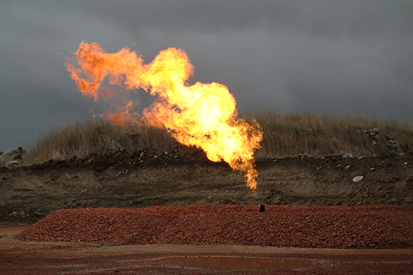 natural gas flaring with orange flame