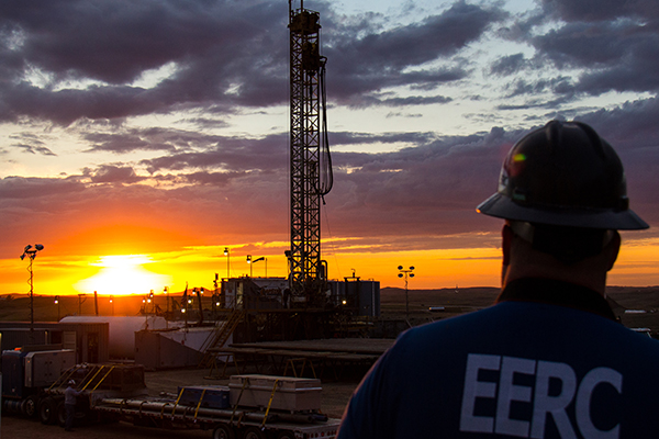 Sunrise over drilling rig